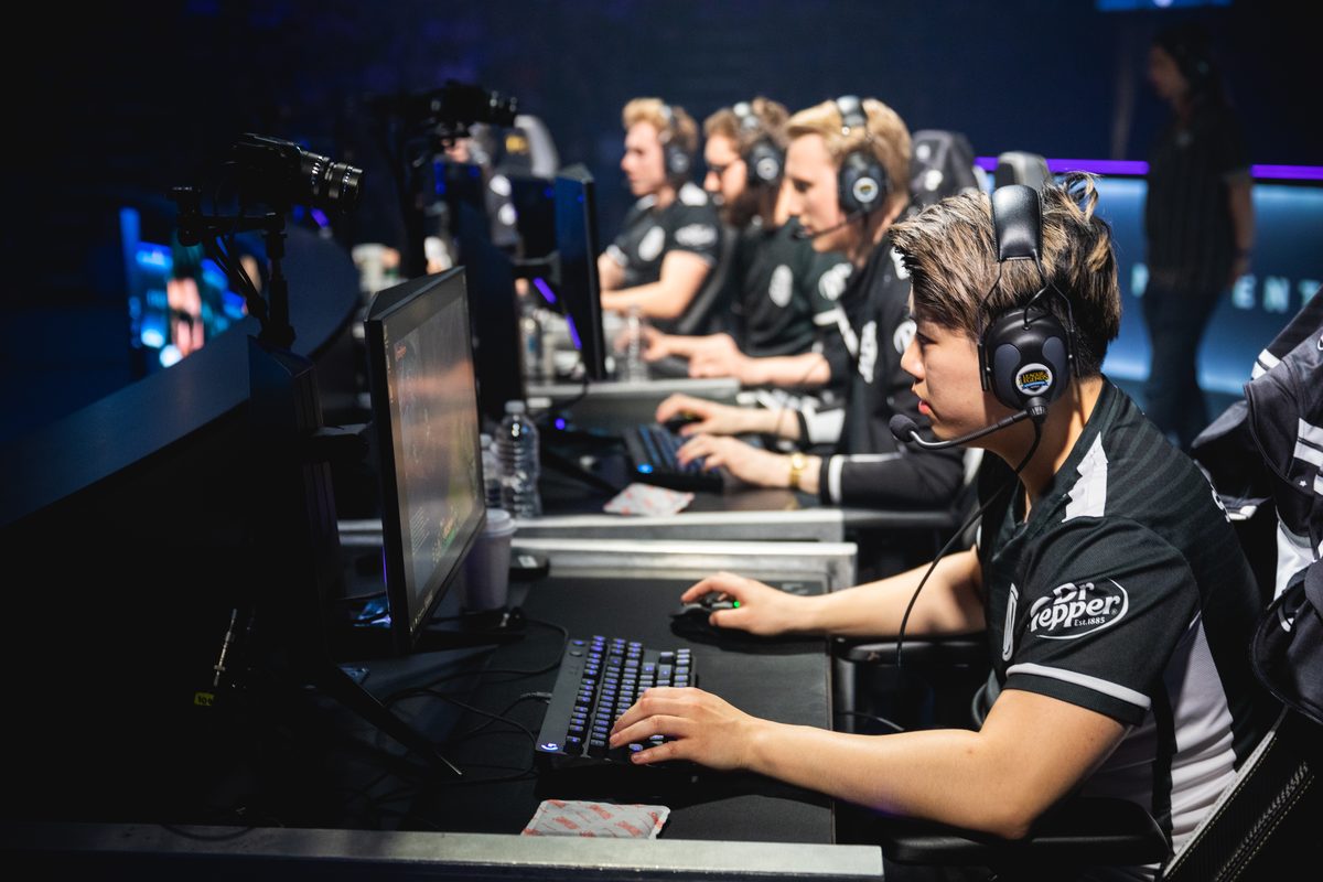 Row of professional esports players competing at a major tournament